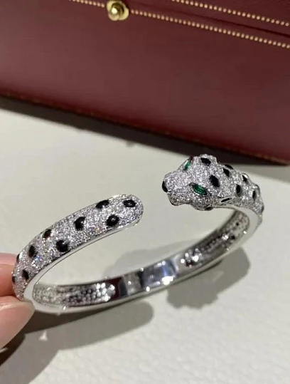 CARTIER Браслет Panthère белое золото, бриллианты и оникс