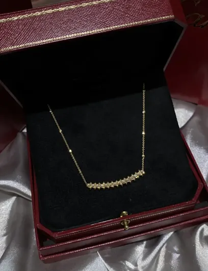 CARTIER Колье Clash из желтого золота с бриллиантами