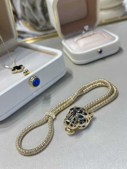 CARTIER Браслет Panthère жёлтое золото, бриллианты и оникс