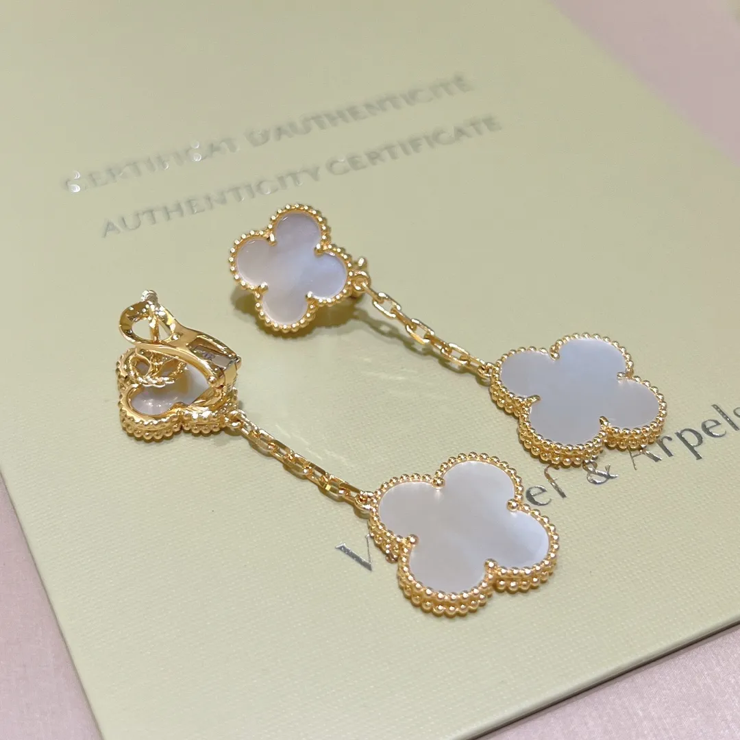 Van Cleef & Arpels Серьги Alhambra желтое золото и перламутр Van Cleef & Arpels Серьги Alhambra желтое золото и перламутр