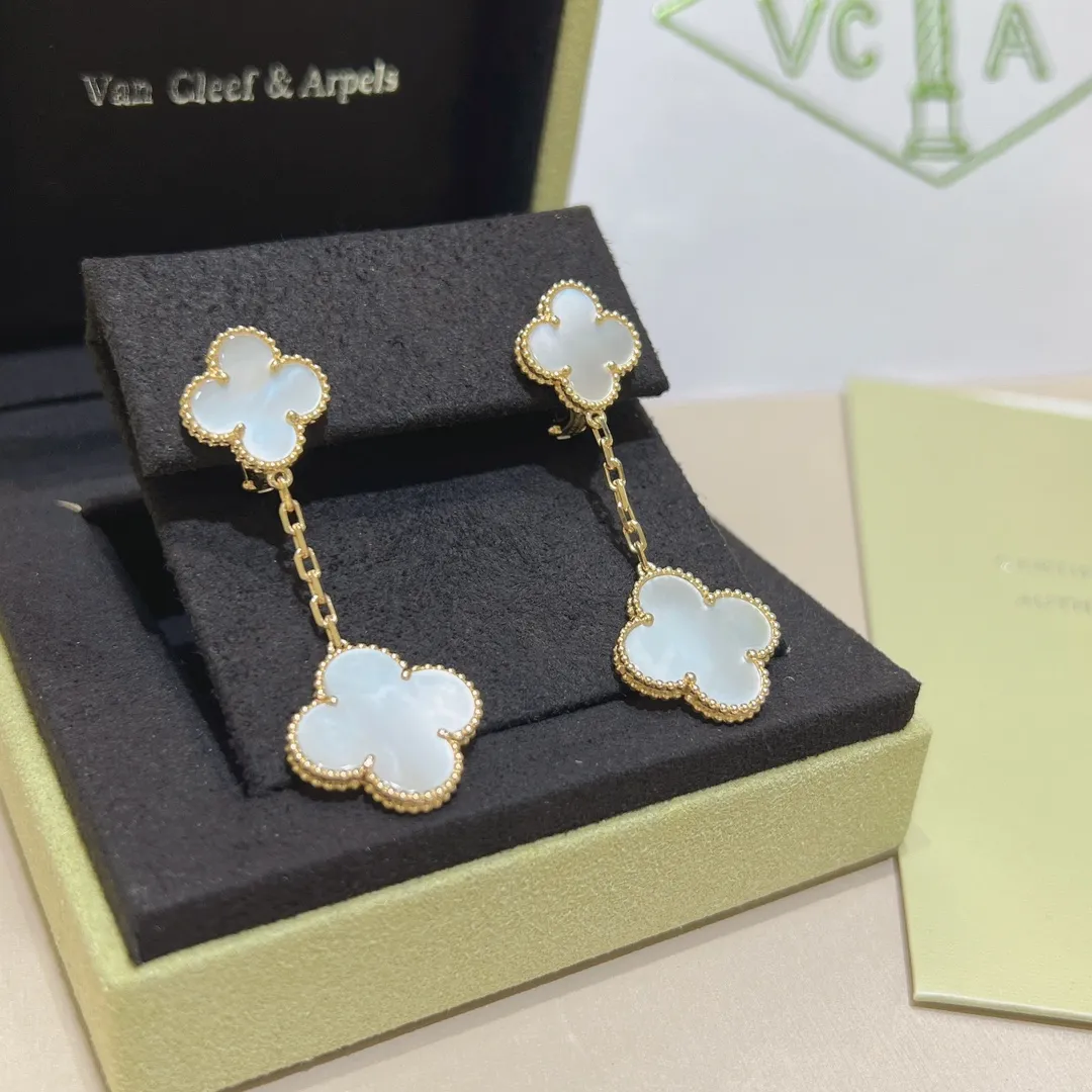 Van Cleef & Arpels Серьги Alhambra желтое золото и перламутр Van Cleef & Arpels Серьги Alhambra желтое золото и перламутр