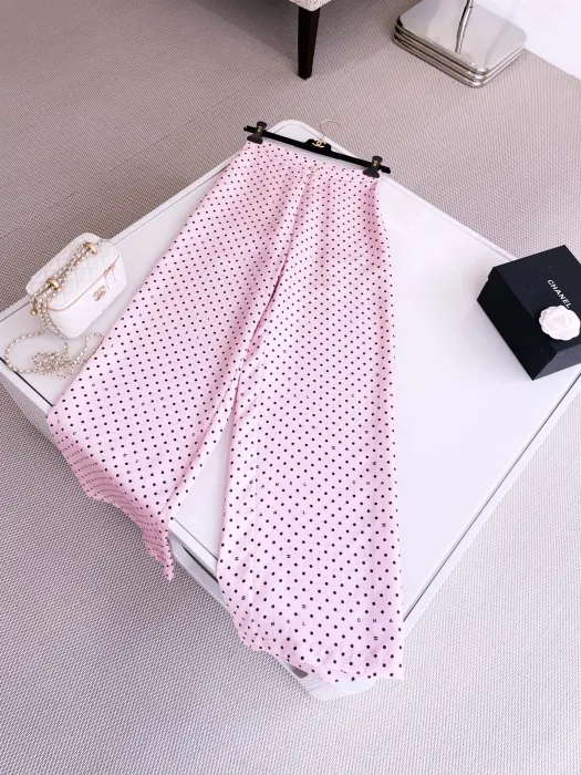 CHANEL Женские брюки в горошек из шелка
