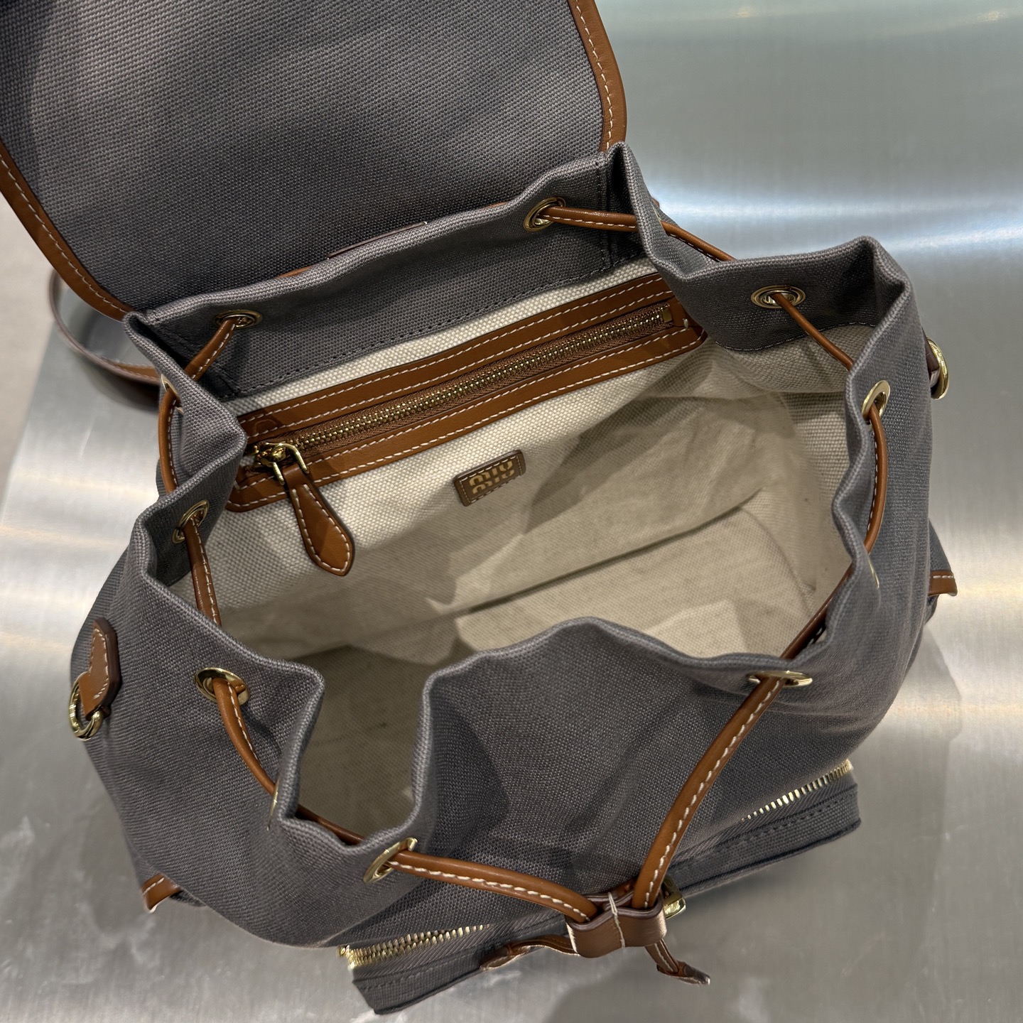 MIU MIU Женский рюкзак Canvas and leather